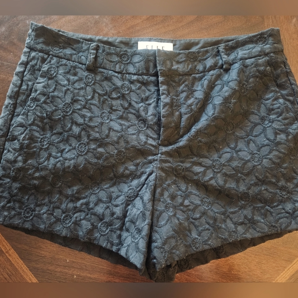 Black shorts- size 2 with stitched flower pattern